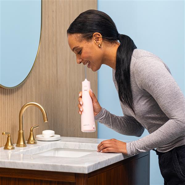 Pink Waterpik™ Cordless Pulse 3100 Water Flosser - Waterpik